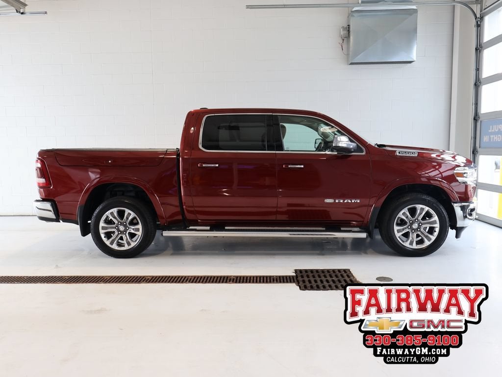 2019 RAM 1500 Longhorn Crew Cab 4x4 5'7" Box in Red — front three-quarter view