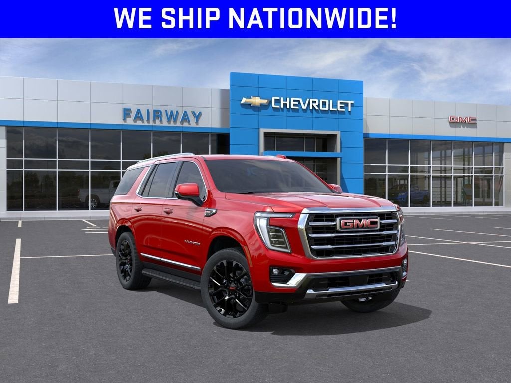 2026 GMC Yukon Elevation in Volcanic Red Tintcoat — front three-quarter view