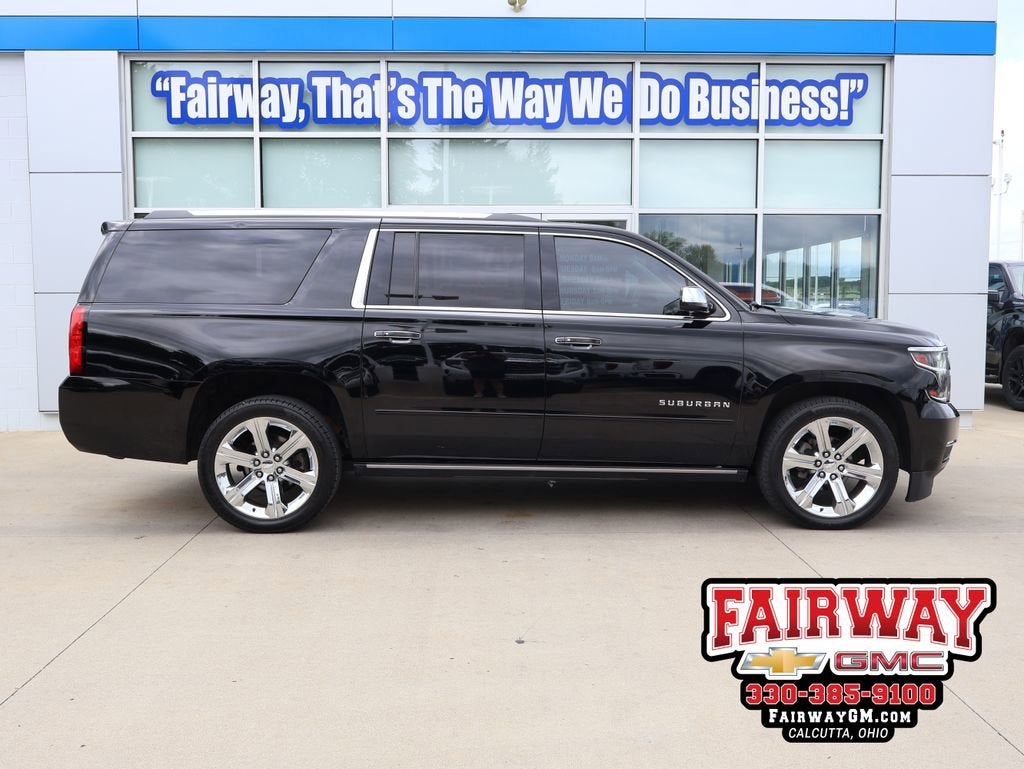 2018 Chevrolet Suburban Premier in Black — front three-quarter view