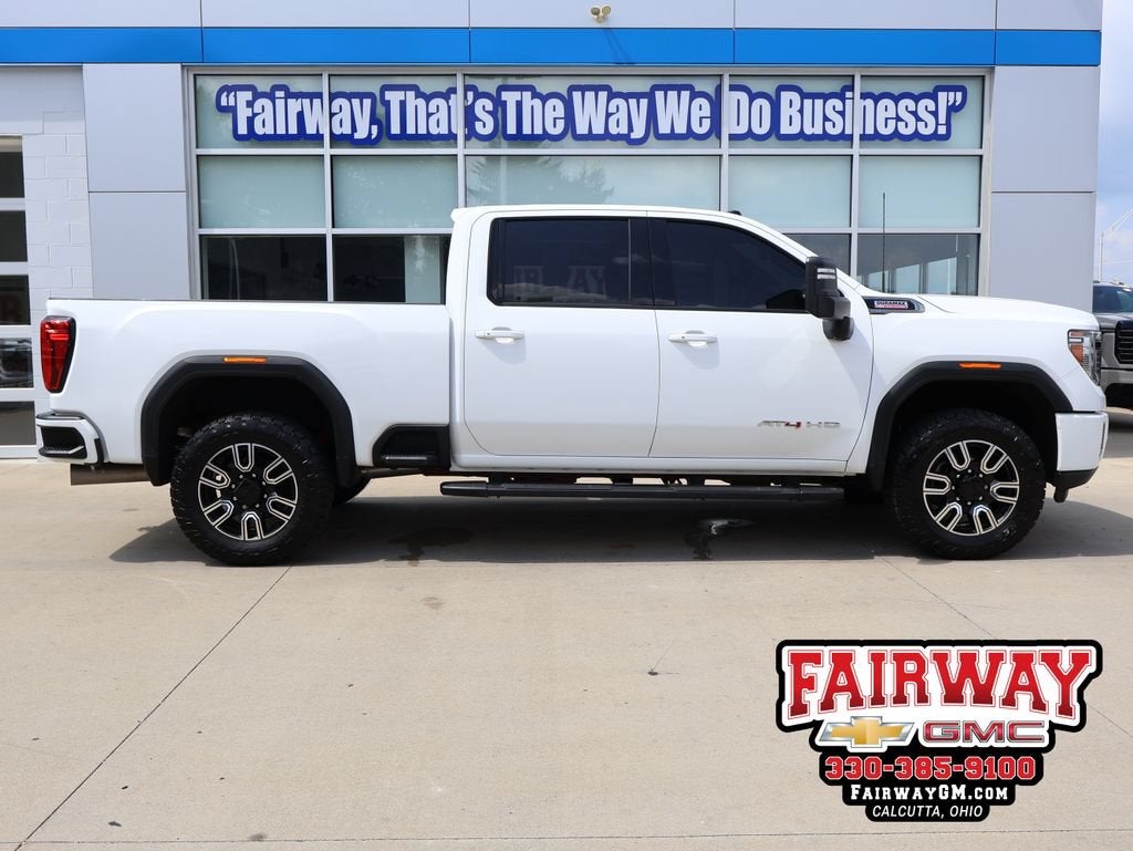 2020 GMC Sierra 2500 HD AT4 in Summit White — front three-quarter view