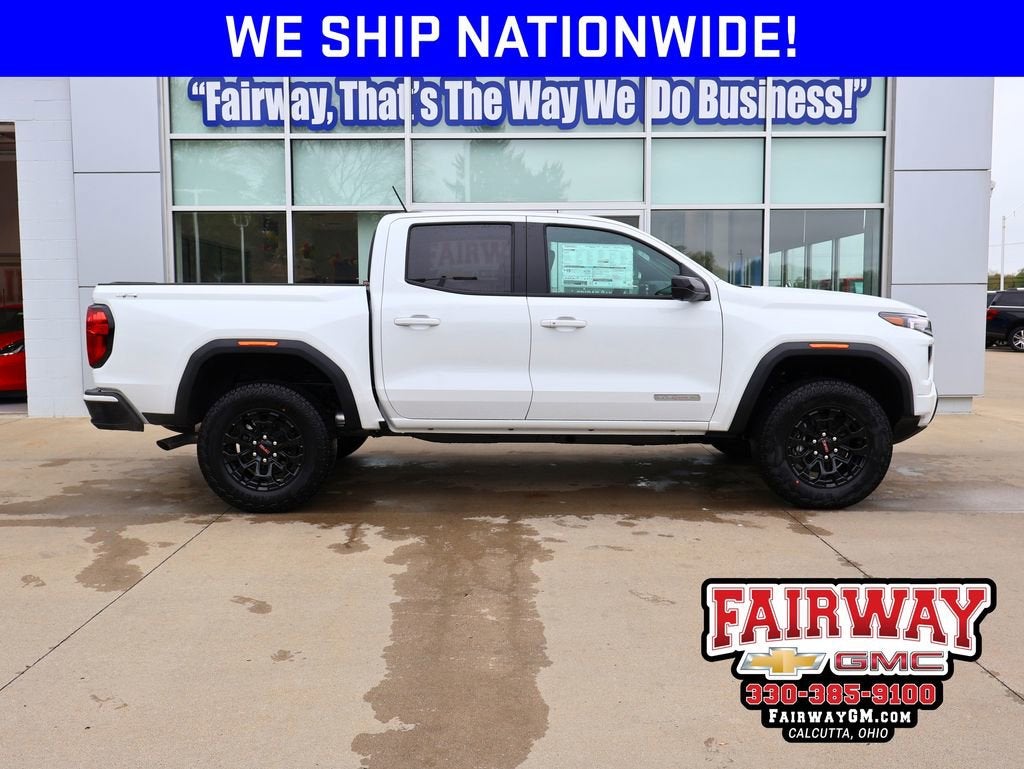 2026 GMC Canyon Elevation in Summit White — front three-quarter view
