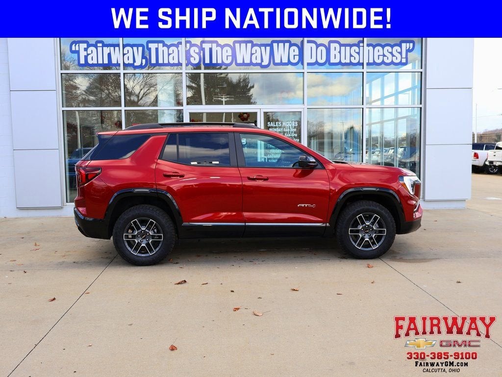 2026 GMC Terrain AT4 in Volcanic Red Tintcoat — front three-quarter view