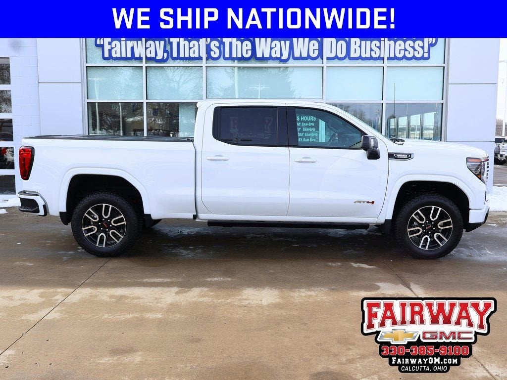 2026 GMC Sierra 1500 AT4 in Summit White — front three-quarter view