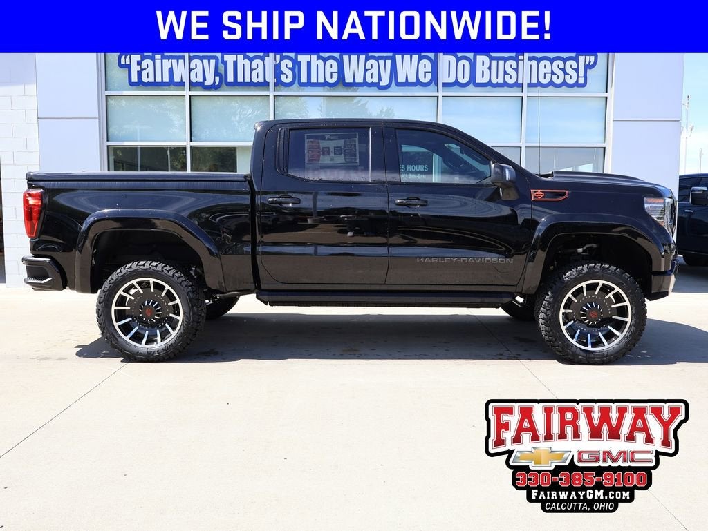 2026 GMC Sierra 1500 AT4 in Onyx Black — front three-quarter view