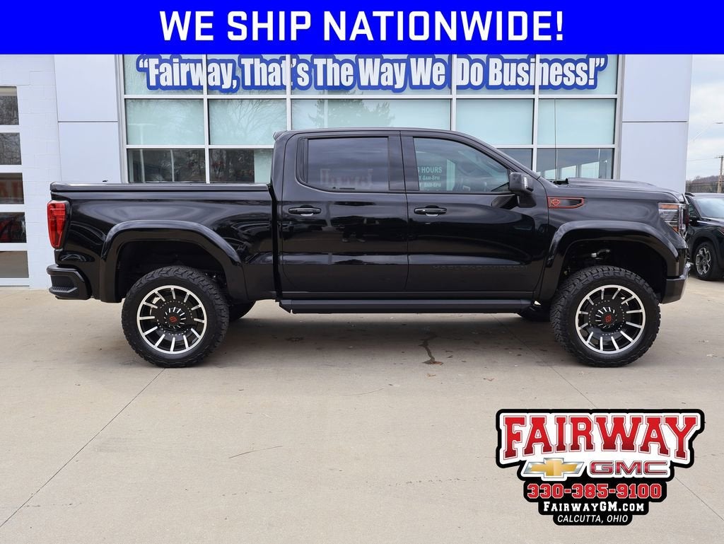 2026 GMC Sierra 1500 AT4 in Onyx Black — front three-quarter view