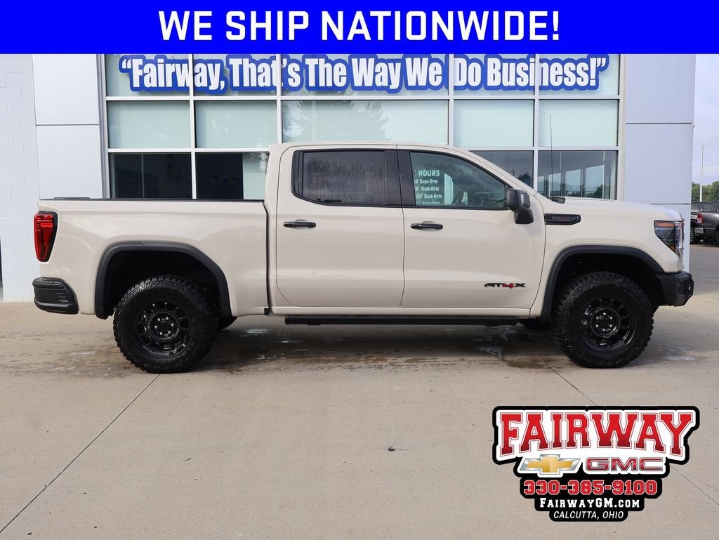 2026 GMC Sierra 1500 AT4X in Coastal Dune — front three-quarter view